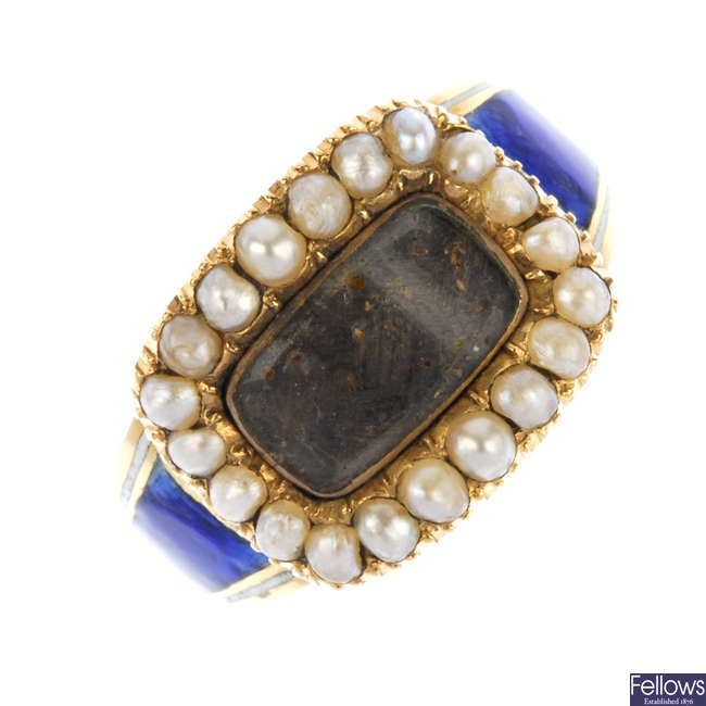 An early 19th century 18ct gold enamel memorial ring.