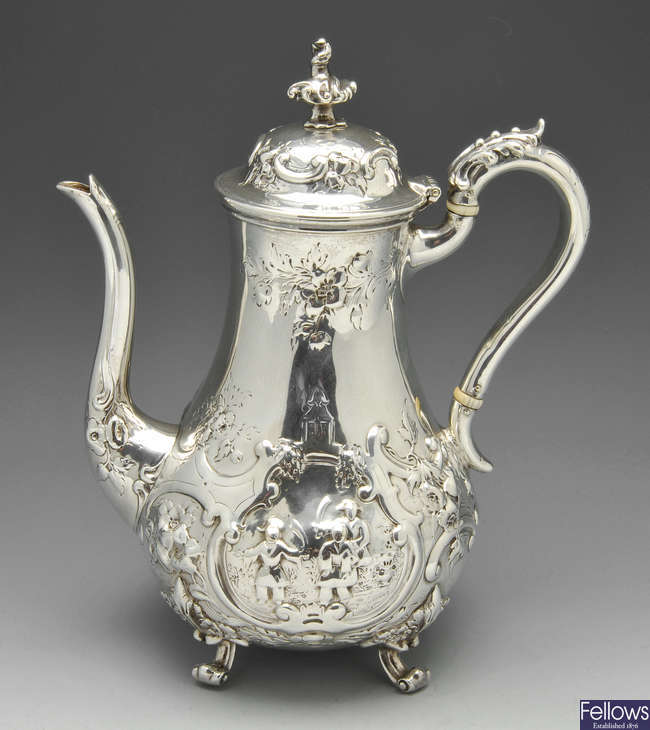 A Victorian silver coffee pot.