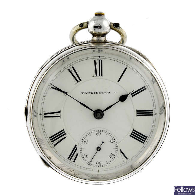 A silver open face pocket watch by Waltham.
