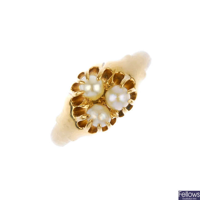 An early 20th century gold cultured pearl dress ring.