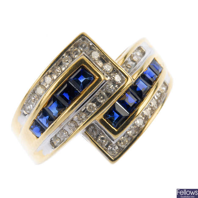 A sapphire and diamond crossover dress ring.