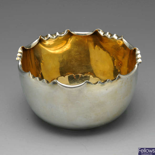 A late Victorian silver sugar bowl.