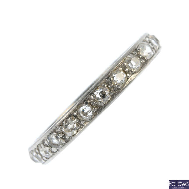 An early 20th century platinum diamond full-circle eternity ring.
