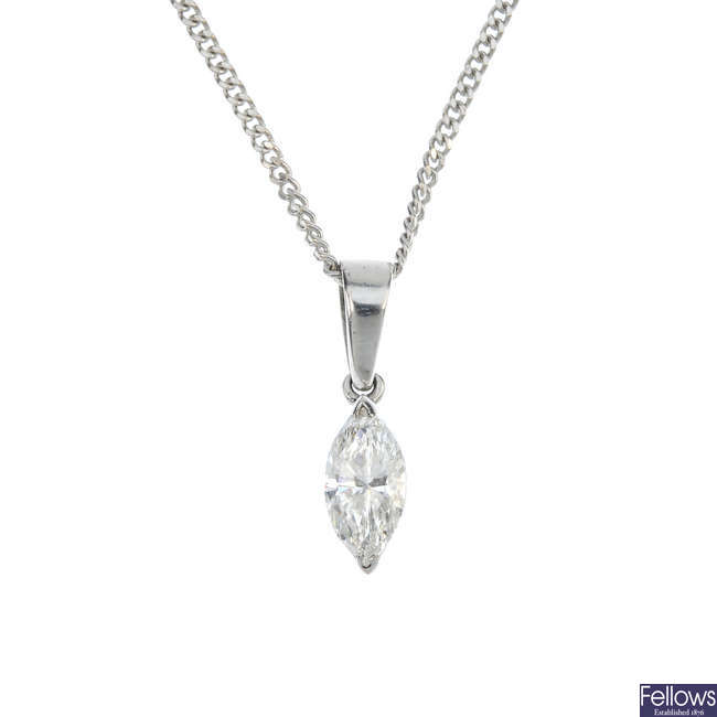 A diamond single-stone pendant.