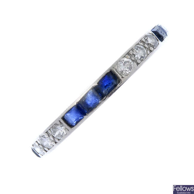 An early 20th century diamond and sapphire full-circle eternity ring.