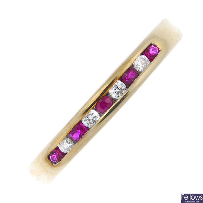 A 9ct gold ruby and diamond band ring.