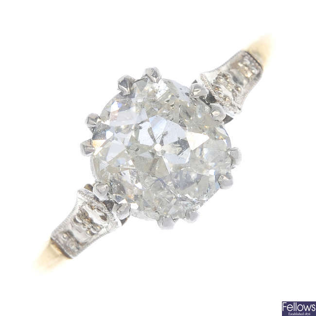 A mid 20th century gold diamond single-stone ring. 