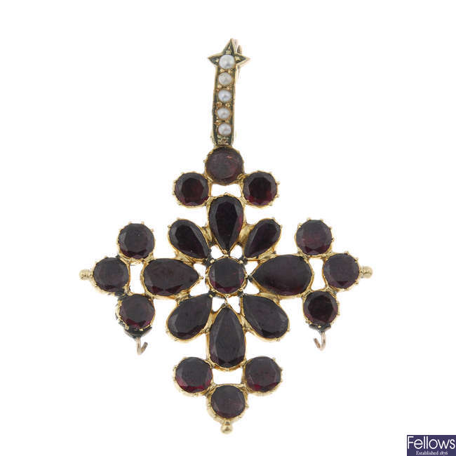An early 19th century gold garnet pendant.