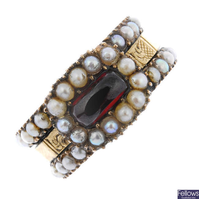 An early 19th century garnet and split pearl mourning ring.