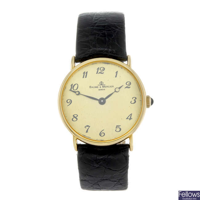 BAUME & MERCIER - a gentleman's yellow metal wrist watch.
