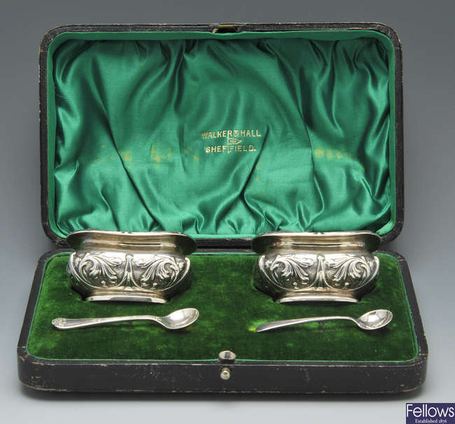 A cased pair of Art Nouveau silver open salts.