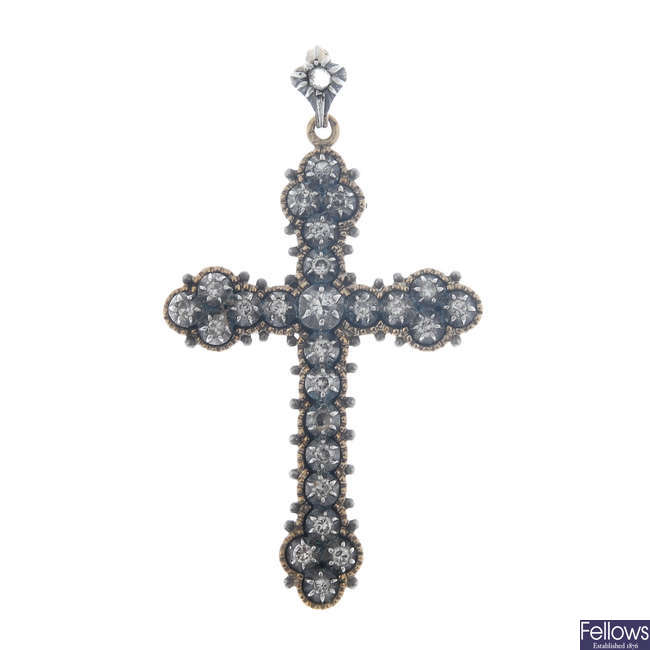 A late Victorian 18ct gold, silver and diamond cross pendant.