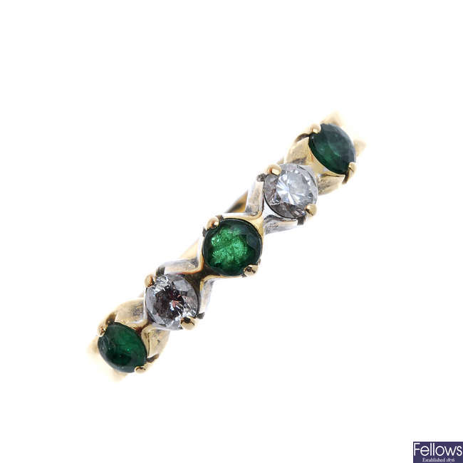 An 18ct gold emerald and diamond five-stone ring.