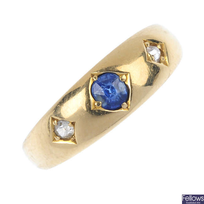 A late 19th century 18ct gold sapphire and diamond three-stone ring.