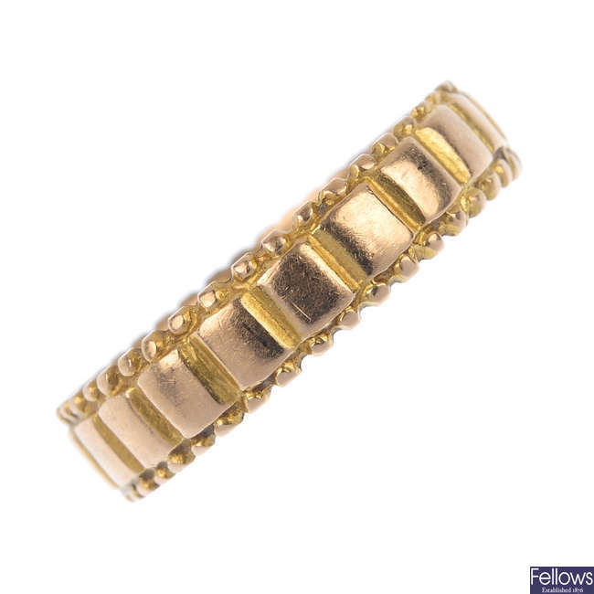 A mid 20th century 18ct gold band ring.