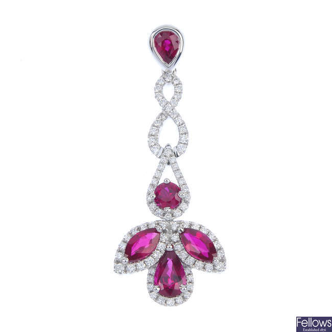 A ruby and diamond pendant.
