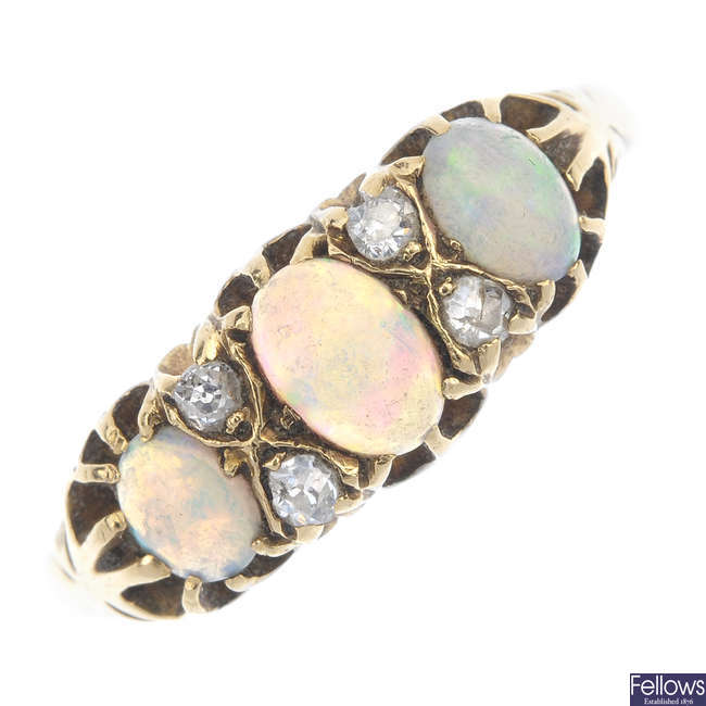 An Edwardian 18ct gold opal and diamond ring.