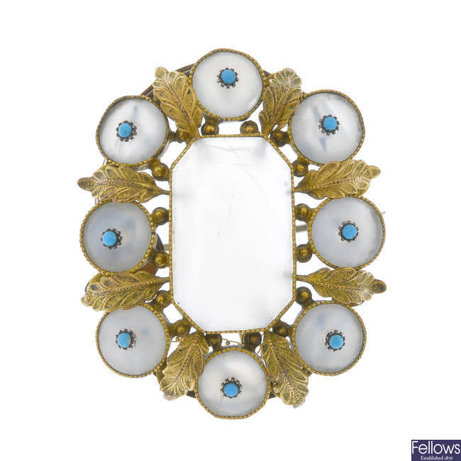 A chalcedony and gem-set brooch.