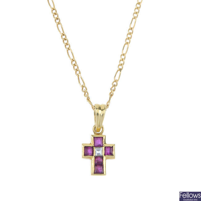 A ruby and diamond cross pendant, with chain.