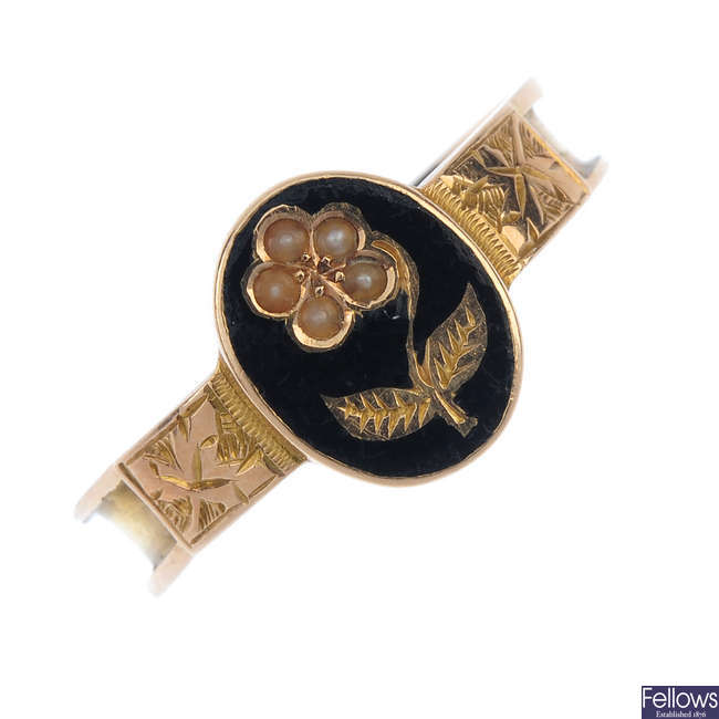 A late Victorian 15ct gold enamel memorial ring. 