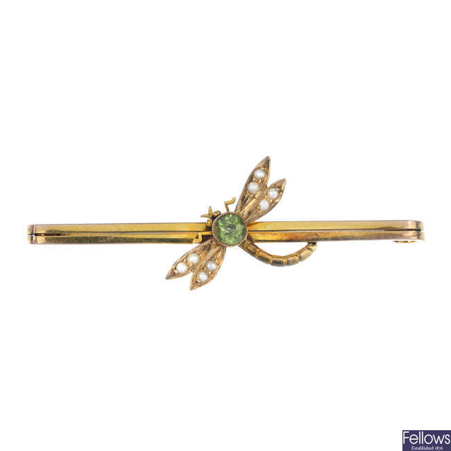 A peridot and split pearl dragonfly bar brooch.