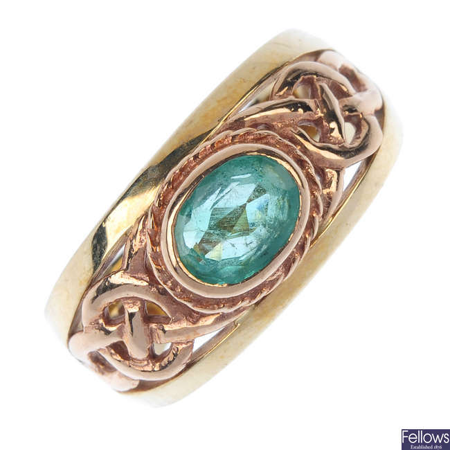 CLOGAU - a 9ct gold emerald single-stone ring.