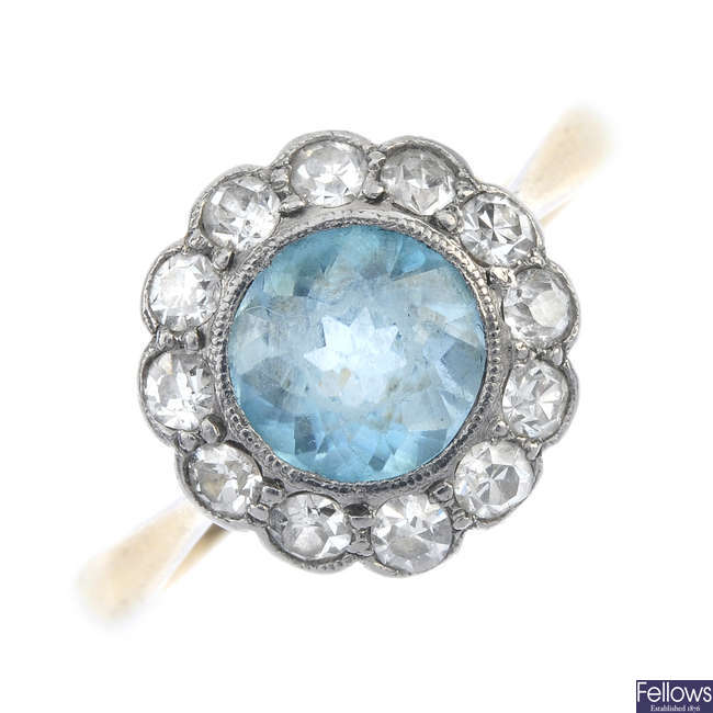 A mid 20th century 18ct gold zircon and diamond cluster ring.