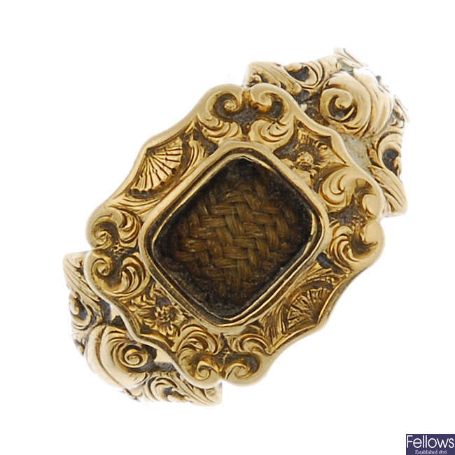 A mid Victorian 18ct gold mourning ring.