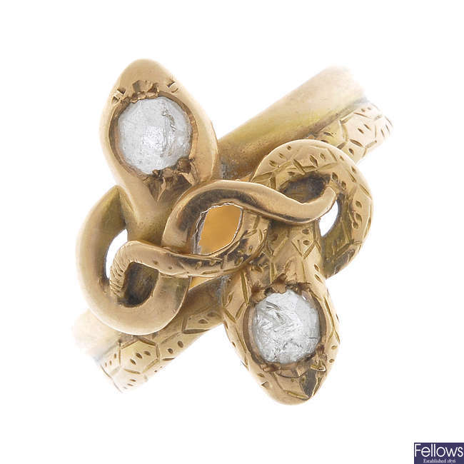 An early 20th century gold diamond snake ring.