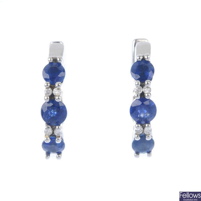 A pair of sapphire and diamond ear hoops.