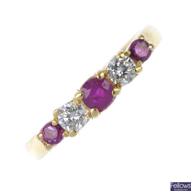 An 18ct gold ruby and diamond five-stone ring. 