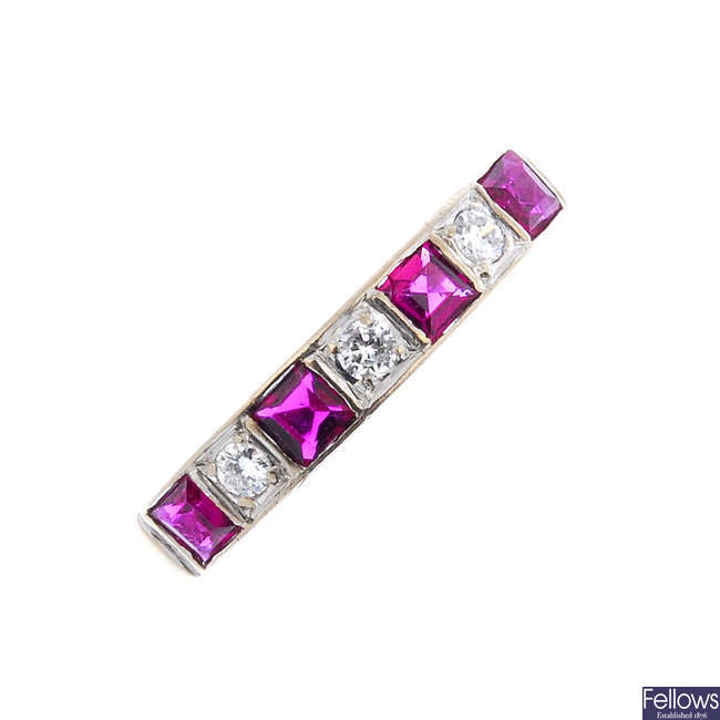 An 18ct gold ruby and diamond dress ring. 
