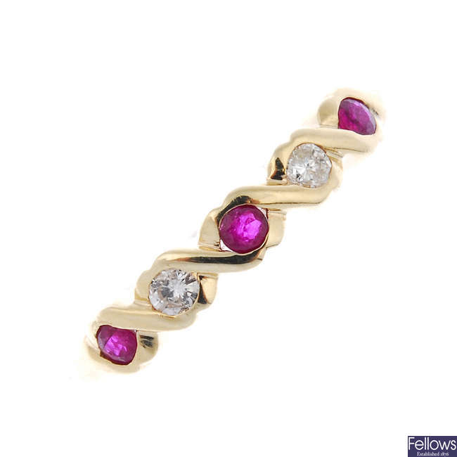A 9ct gold ruby and diamond dress ring. 
