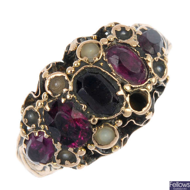 A mid Victorian 9ct gold garnet and split pearl ring.