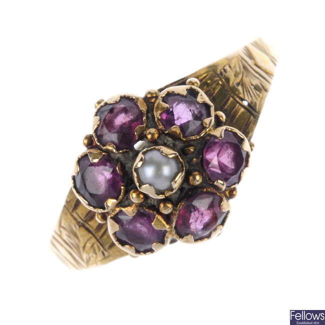 A mid Victorian 15ct gold garnet and split pearl ring.