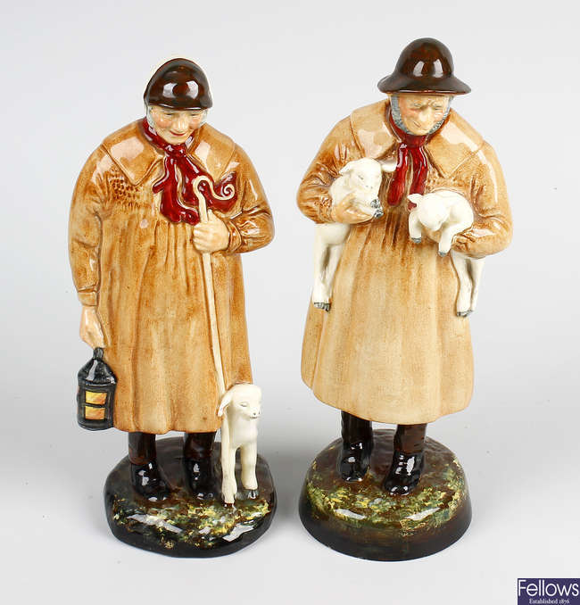 A pair of Royal Doulton figures. 