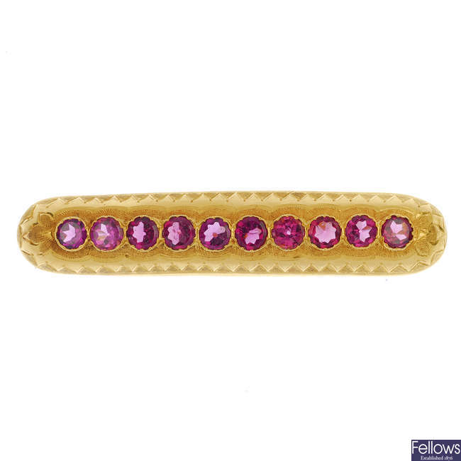 A late 19th century continental 18ct gold garnet brooch.