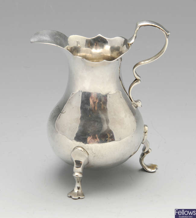 An early George III silver cream jug.