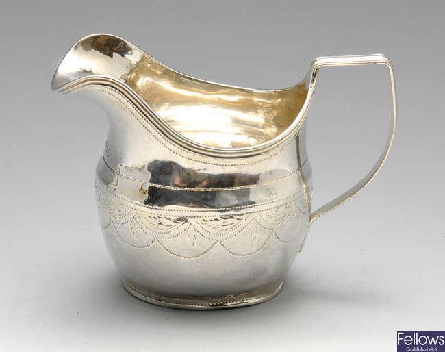 A George III silver cream jug.