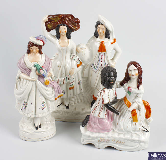A Staffordshire flat back figure group, plus two others. 