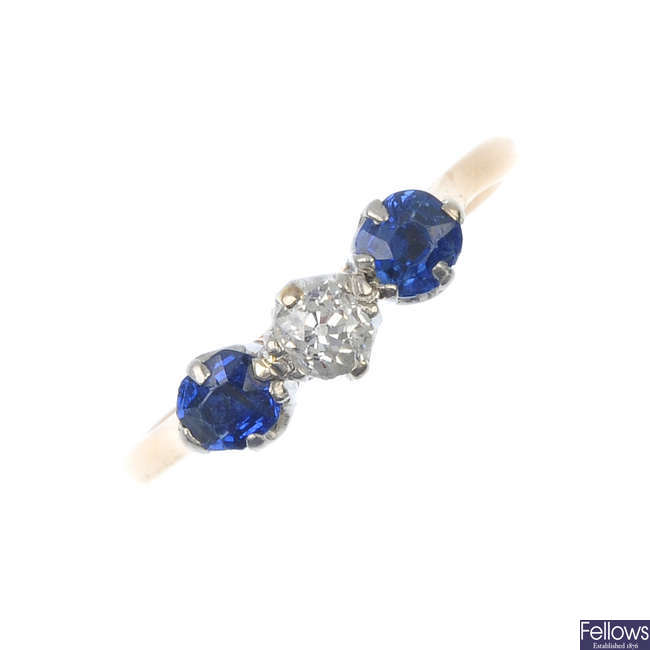 An early 20th century 9ct gold diamond and sapphire three-stone ring. 