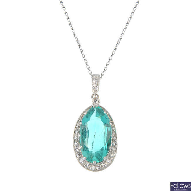 A Columbian emerald and diamond pendant.