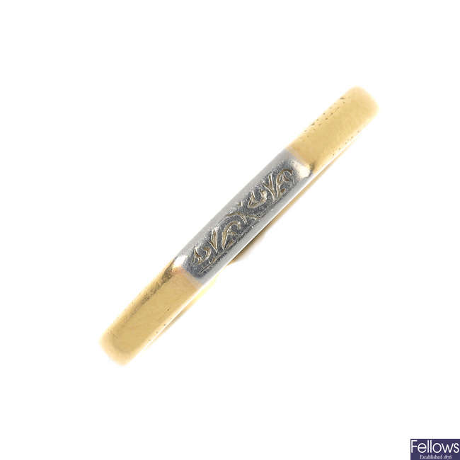 An early 20th century 22ct gold and platinum band ring. 
