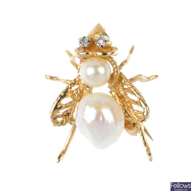 A diamond and cultured pearl fly brooch.