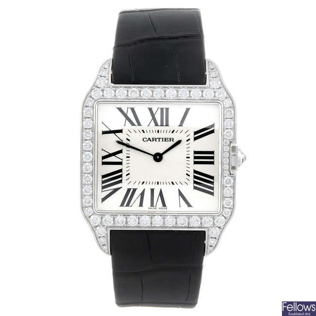 CARTIER - an 18ct white gold Santos Dumont wrist watch.