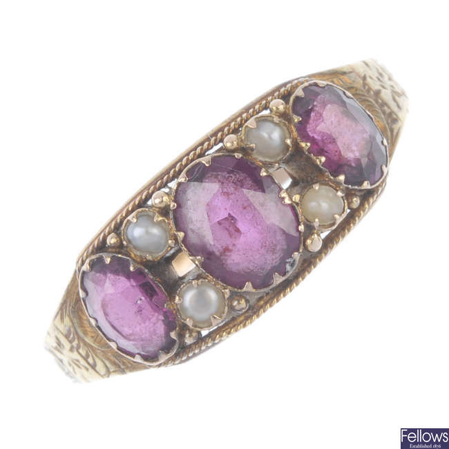 A late Victorian 15ct gold garnet and split pearl ring.