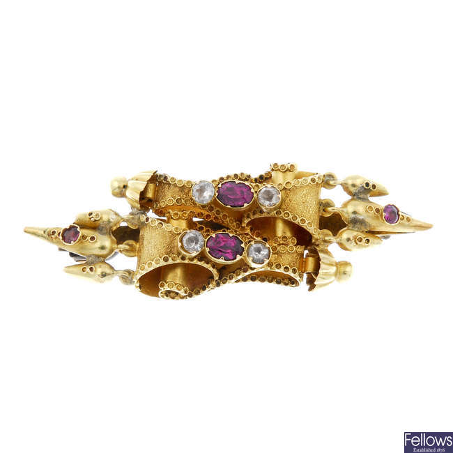  A late 19th century 18ct gold garnet and gem-set brooch. 