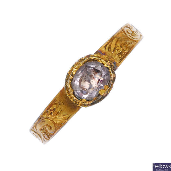 A mid 19th century rock crystal 9ct gold ring.