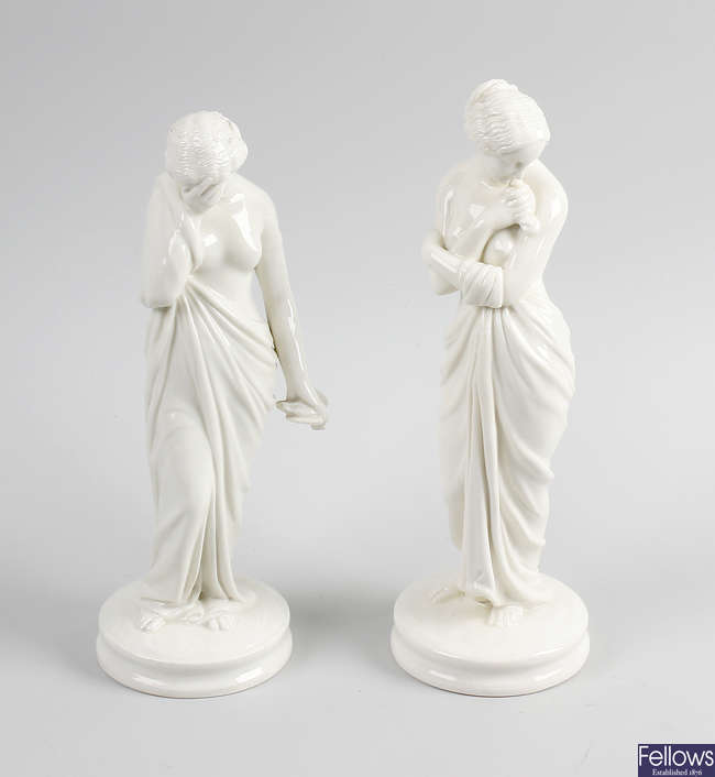 A pair of figures. 