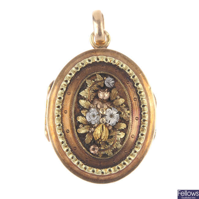A mid 19th century 18ct gold floral locket.